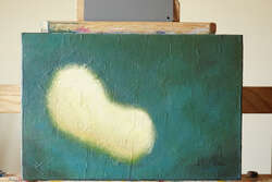 An abstract painting of a footprint in the sand? A cloud in the sky? I hesitate to say.