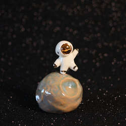 Bounding Astronaut Figurine