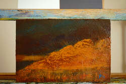 A rough, textured painting of red desert rock in the late afternoon.