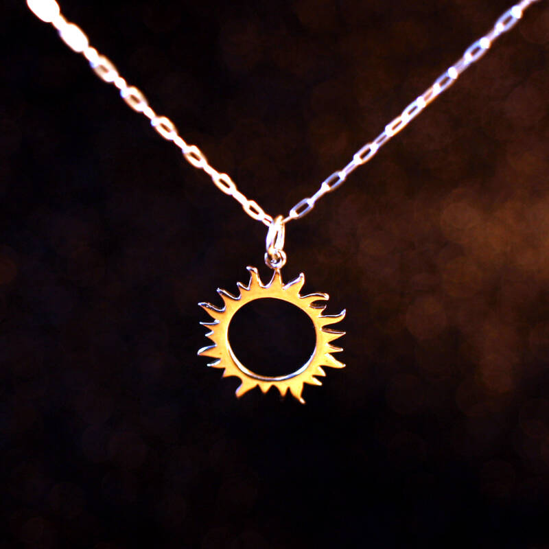 Sterling Silver Sun necklace.