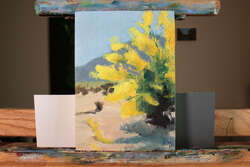 Painting of a palo verde blooming in the desert.